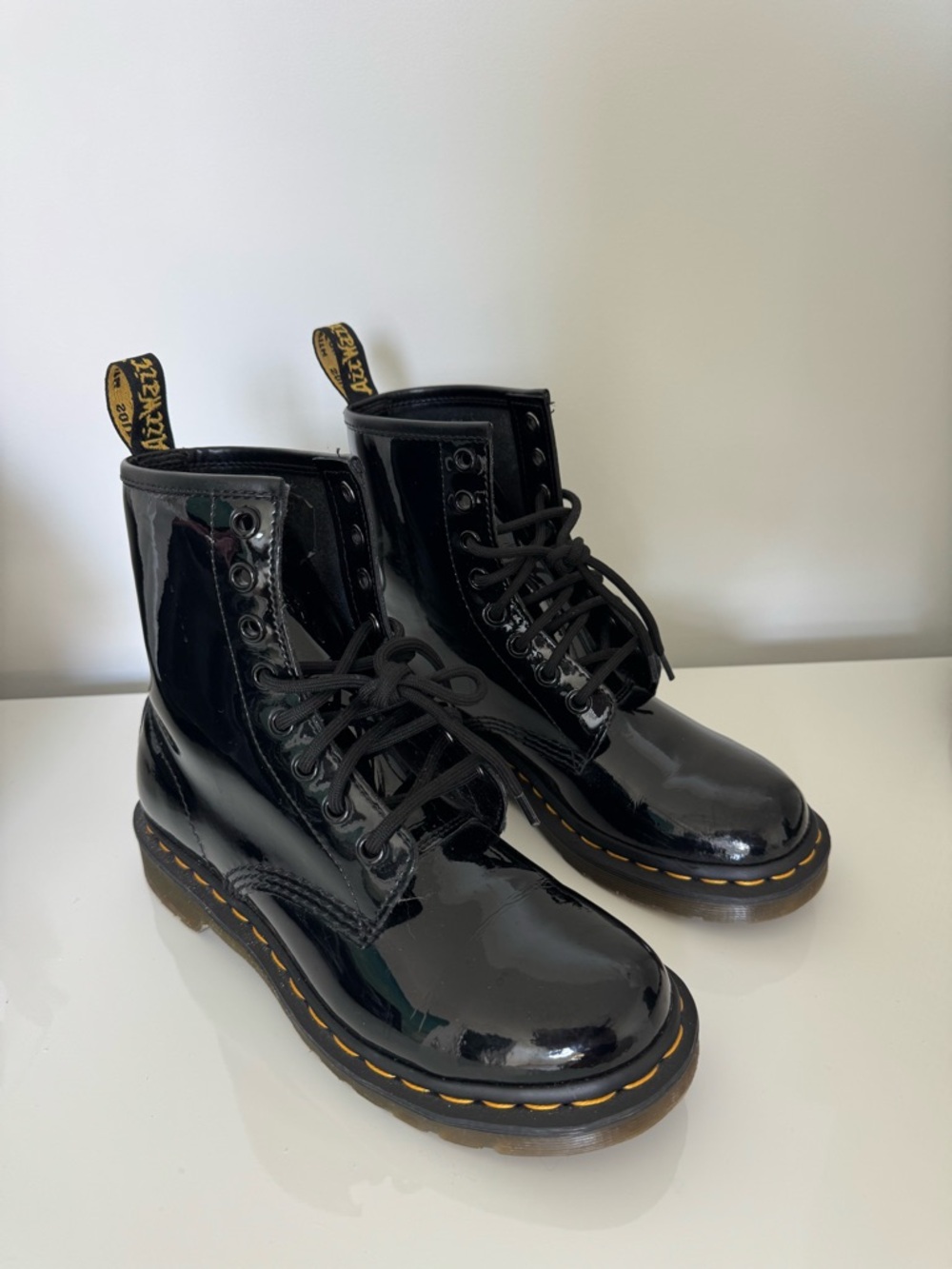 Dr. Martens Black Patent Lace-Up Combat Boots with Yellow Stitching